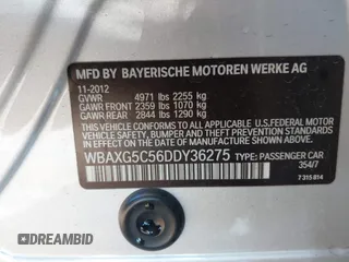 2013 BMW 5 Series 528i with VIN WBAXG5C56DDY36275, listed as a IAAI auction lot 41881102 with 104,022 mi miles and . Bid and sale history available at carsss.com. Image 9.