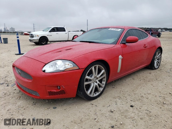 2007 Jaguar XK with VIN SAJWA43C379B19952, listed as a Copart auction lot 85141054 with 49,599 mi miles and Salvage Title. Bid and sale history available at carsss.com. Image 1.