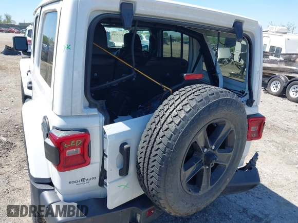 2021 Jeep Wrangler Unlimited Sahara z VIN 1C4HJXEN2MW528137, wystawiony jako IAAI lot #42134514 z przebiegiem 50 030 mil mil oraz . Historia ofert i sprzedaży dostępna na DreamBid. Obrazek 6.