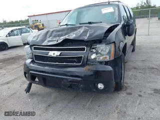 2014 Chevrolet Suburban LT with VIN 1GNSKJE73ER130976, listed as a IAAI auction lot 42016692 with 73,263 mi miles. Bid and sale history available at carsss.com. Image 6.