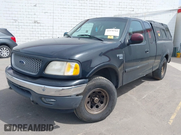 1999 Ford F-150 XL with VIN 1FTRX18L8XNB25526, listed as a IAAI auction lot 41970764 with 1 mi miles. Bid and sale history available at carsss.com. Image 2.