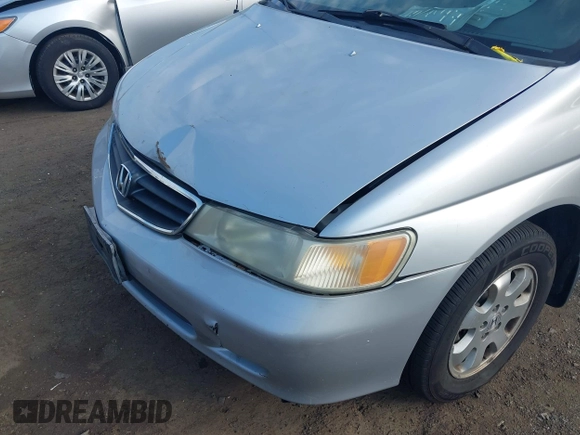 2003 Honda Odyssey EX-L with VIN 5FNRL18913B061340, listed as a IAAI auction lot 42633790 with 1,281,195 mi miles and . Bid and sale history available at DreamBid. Image 6.
