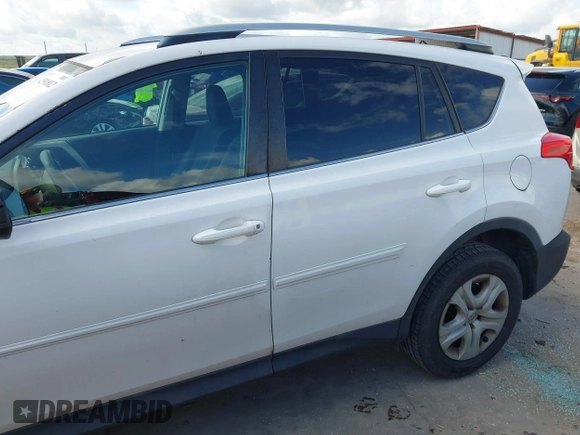 2014 Toyota RAV4 LE with VIN 2T3ZFREV1EW075503, listed as a IAAI auction lot 42591812 with 265,426 mi miles and . Bid and sale history available at DreamBid. Image 14.