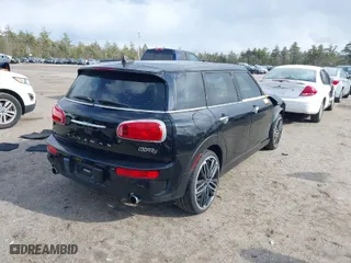 2016 MINI Cooper Clubman S with VIN WMWLN9C53G2E47754, listed as a IAAI auction lot 41893769 with 67,654 mi miles. Bid and sale history available at carsss.com. Image 4.