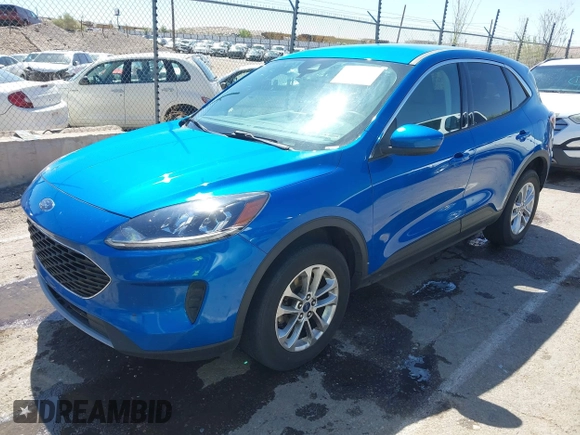 2021 Ford Escape SE with VIN 1FMCU9G6XMUA81082, listed as a IAAI auction lot 42056323 with 83,904 mi miles. Bid and sale history available at carsss.com. Image 2.
