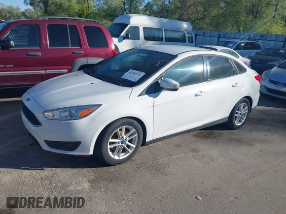 2015 Ford Focus SE with VIN 1FADP3F25FL282916, listed as a IAAI auction lot 42099759 with 152,445 mi miles. Bid and sale history available at carsss.com. Image 2.