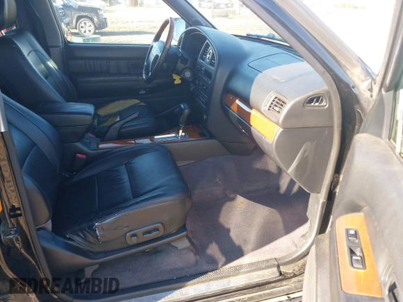 2001 Infiniti QX4 with VIN JNRDR09X21W203722, listed as a IAAI auction lot 41695963 with 123,735 mi miles and . Bid and sale history available at DreamBid. Image 5.