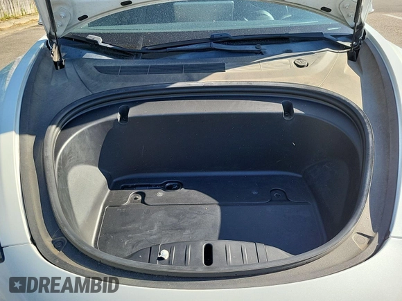 2020 Tesla Model 3 Long Range with VIN 5YJ3E1EB7LF637357, listed as a IAAI auction lot 42184528 with 89,909 mi miles. Bid and sale history available at carsss.com. Image 1.