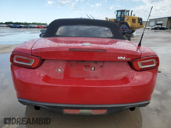2017 FIAT 124 Spider Lusso z VIN JC1NFAEKXH0102435, wystawiony jako Copart lot #54235675 z przebiegiem 84 343 mil mil oraz Szkoda całkowita • Salvage title. Historia ofert i sprzedaży dostępna na DreamBid. Obrazek 6.