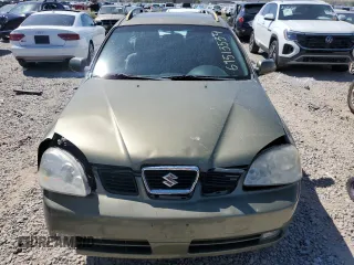 2005 Suzuki Forenza z VIN KL5JJ86Z25K095152, wystawiony jako Copart lot #69513534 z przebiegiem 40 534 mil mil oraz Szkody całkowita. Historia ofert i sprzedaży dostępna na DreamBid. Obrazek 5.