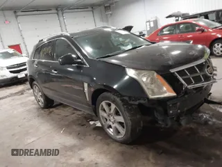 2011 Cadillac SRX Performance Collection with VIN 3GYFNEEY9BS533994, listed as a IAAI auction lot 40990072 with 168,134 mi miles. Bid and sale history available at carsss.com. Image 1.