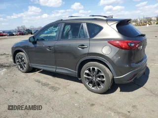 2016 Mazda CX-5 Grand Touring with VIN JM3KE4DY1G0806674, listed as a Copart auction lot 50549465 with 139,753 mi miles and Salvage Title. Bid and sale history available at carsss.com. Image 2.