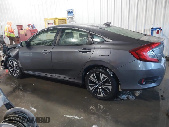2018 Honda Civic EX-T with VIN JHMFC1F35JX031132, listed as a IAAI auction lot 41591028 with 111,087 mi miles and . Bid and sale history available at DreamBid. Image 14.