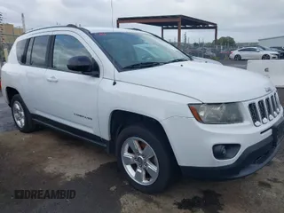 2014 Jeep Compass Altitude with VIN 1C4NJCBA8ED606589, listed as a IAAI auction lot 41939914 with 148,281 mi miles. Bid and sale history available at carsss.com. Image 1.