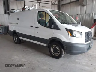 2016 Ford Transit Cargo z VIN 1FTYR1YM7GKB55438, wystawiony jako IAAI lot #42497571 z przebiegiem 66 612 mil mil oraz . Historia ofert i sprzedaży dostępna na DreamBid. Obrazek 1.