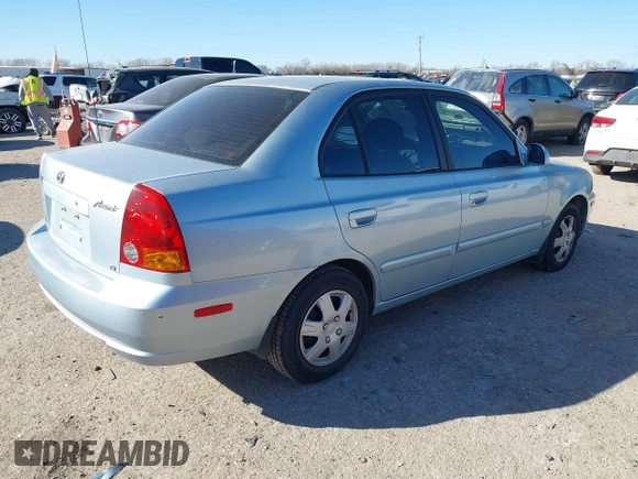 2003 Hyundai Accent GL with VIN KMHCG45C73U455357, listed as a IAAI auction lot 41395159 with 86,488 mi miles. Bid and sale history available at carsss.com. Image 4.