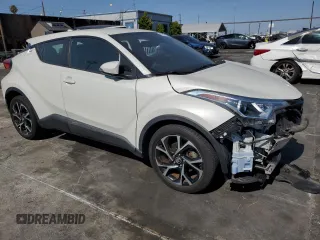 2018 Toyota C-HR XLE z VIN NMTKHMBX8JR015992, wystawiony jako Copart lot #65197115 z przebiegiem 49 226 mil mil oraz Szkoda całkowita • Salvage title. Historia ofert i sprzedaży dostępna na DreamBid. Obrazek 4.