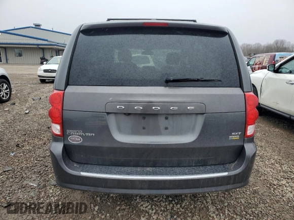 2019 Dodge Grand Caravan SXT with VIN 2C4RDGCGXKR518476, listed as a Copart auction lot 52341455 with 59,102 mi miles and Salvage Title. Bid and sale history available at DreamBid. Image 6.