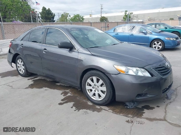 2009 Toyota Camry Hybrid with VIN 4T1BB46K09U103133, listed as a IAAI auction lot 42078242 with 245,455 mi miles. Bid and sale history available at carsss.com. Image 1.