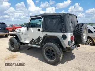 2004 Jeep Wrangler Sport z VIN 1J4FA49SX4P802341, wystawiony jako Copart lot #62752565 z przebiegiem 150 197 mil mil oraz Szkoda całkowita • Salvage title. Historia ofert i sprzedaży dostępna na DreamBid. Obrazek 2.