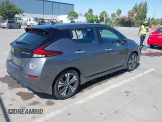 2019 Nissan LEAF SV z VIN 1N4AZ1CP6KC304997, wystawiony jako IAAI lot #42090564 z przebiegiem 54 069 mil mil oraz . Historia ofert i sprzedaży dostępna na DreamBid. Obrazek 4.
