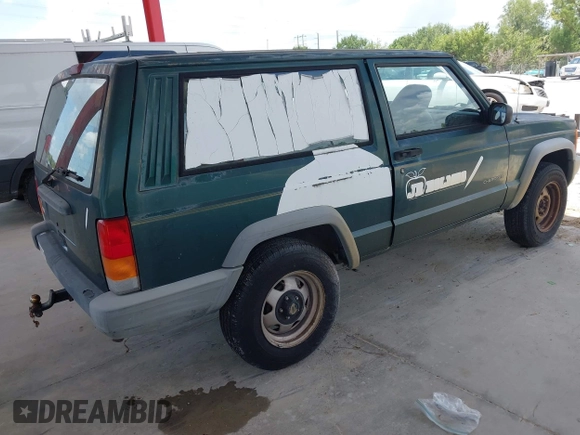 2000 Jeep Cherokee SE z VIN 1J4FT27P0YL185249, wystawiony jako IAAI lot #42650722 z przebiegiem 129 092 mil mil oraz . Historia ofert i sprzedaży dostępna na DreamBid. Obrazek 4.