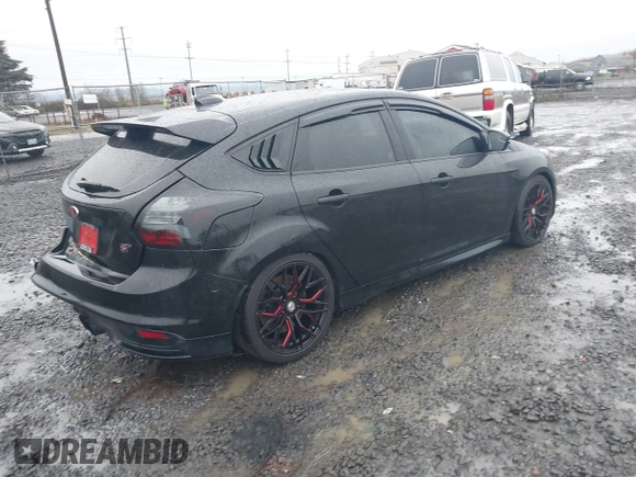 2014 Ford Focus ST with VIN 1FADP3L91EL441379, listed as a IAAI auction lot 41092598 with 58,670 mi miles and . Bid and sale history available at carsss.com. Image 4.