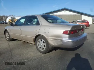 1999 Toyota Camry LE z VIN JT2BF22K4X0199123, wystawiony jako Copart lot #53456665 z przebiegiem 181 526 mil mil oraz Szkoda całkowita • Salvage title. Historia ofert i sprzedaży dostępna na DreamBid. Obrazek 2.