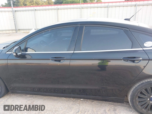 2015 Ford Fusion SE Hybrid with VIN 3FA6P0LU8FR310626, listed as a IAAI auction lot 40048581 with 124,086 mi miles and . Bid and sale history available at DreamBid. Image 14.