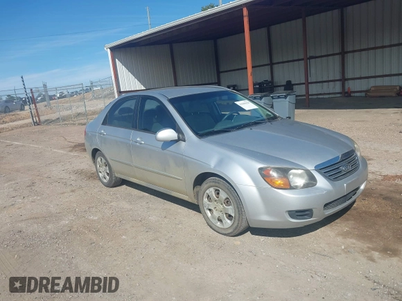 2009 Kia Spectra EX with VIN KNAFE221995647605, listed as a IAAI auction lot 41680420 with 169,000 mi miles. Bid and sale history available at carsss.com. Image 1.