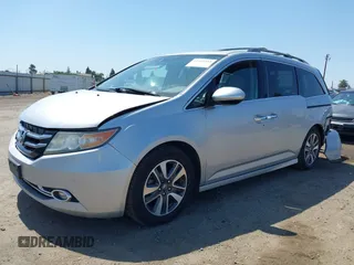 2014 Honda Odyssey Touring with VIN 5FNRL5H91EB068427, listed as a IAAI auction lot 42163315 with 184,134 mi miles and . Bid and sale history available at DreamBid. Image 15.