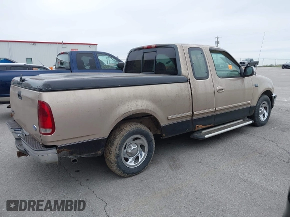 1997 Ford F-150 with VIN 2FTEX17L2VCA10536, listed as a IAAI auction lot 41917990 with 296,879 mi miles and . Bid and sale history available at DreamBid. Image 4.