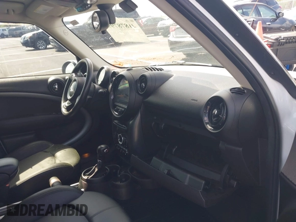 2016 MINI Countryman S with VIN WMWZC3C51GWT10458, listed as a IAAI auction lot 41878799 with 112,019 mi miles and . Bid and sale history available at DreamBid. Image 5.