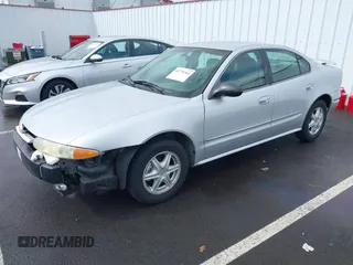 2003 Oldsmobile Alero GL1 z VIN 1G3NL52F93C310114, wystawiony jako IAAI lot #41778264 z przebiegiem Nie podano mil oraz . Historia ofert i sprzedaży dostępna na DreamBid. Obrazek 19.