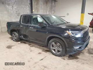 2022 Honda Ridgeline RTL-E with VIN 5FPYK3F73NB023341, listed as a Copart auction lot 48492955 with 42,612 mi miles and Salvage title. Bid and sale history available at DreamBid. Image 4.