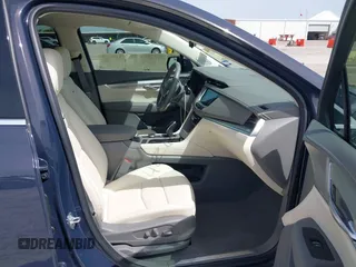 2024 Cadillac XT5 FWD Premium Luxury with VIN 1GYKNCR41RZ738779, listed as a IAAI auction lot 42266837 with 3,166 mi miles and . Bid and sale history available at DreamBid. Image 5.