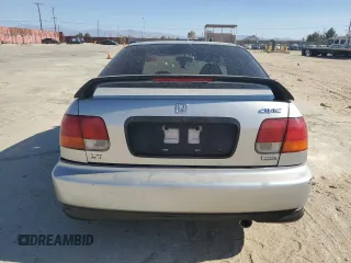 1998 Honda Civic LX z VIN 2HGEJ6576WH566858, wystawiony jako Copart lot #63260834 z przebiegiem 225 031 mil mil oraz Szkoda całkowita • Salvage title. Historia ofert i sprzedaży dostępna na DreamBid. Obrazek 6.