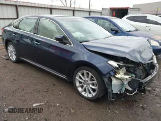 2014 Toyota Avalon Limited z VIN 4T1BK1EB7EU135958, wystawiony jako IAAI lot #41935681 z przebiegiem 137 199 mil mil oraz . Historia ofert i sprzedaży dostępna na DreamBid. Obrazek 1.