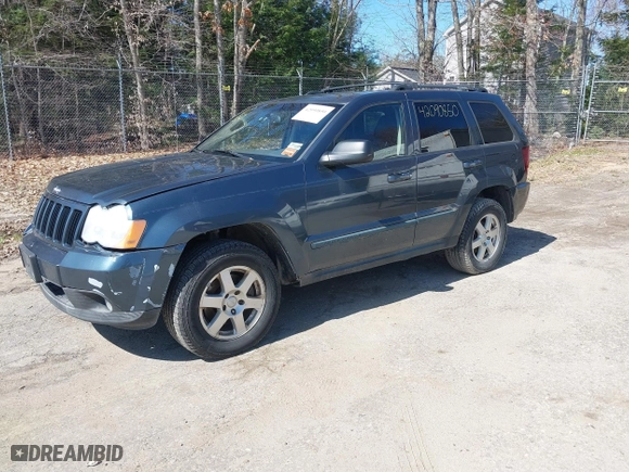 2008 Jeep Grand Cherokee Laredo with VIN 1J8GR48K98C161239, listed as a IAAI auction lot 42090850 with 218,063 mi miles. Bid and sale history available at carsss.com. Image 2.