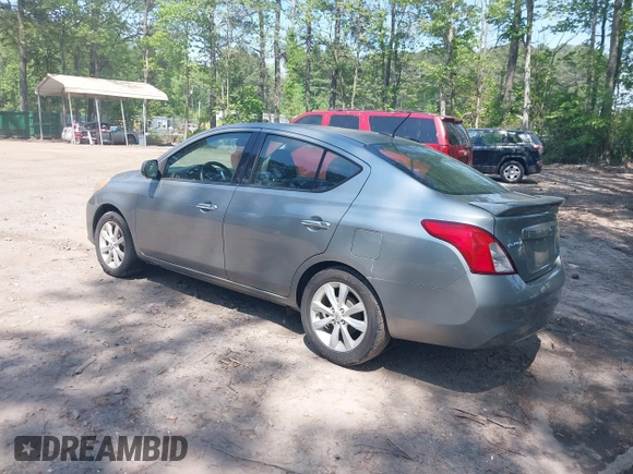 2014 Nissan Versa SV with VIN 3N1CN7AP2EL851670, listed as a IAAI auction lot 42167654 with 112,277 mi miles. Bid and sale history available at carsss.com. Image 3.