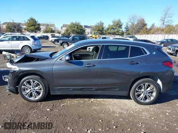 2022 BMW X2 xDrive28i z VIN WBXYJ1C05N5U40472, wystawiony jako IAAI lot #41433452 z przebiegiem 67 801 mil mil oraz . Historia ofert i sprzedaży dostępna na DreamBid. Obrazek 13.