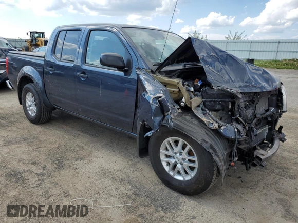 2019 Nissan Frontier SV with VIN 1N6AD0EV5KN775054, listed as a Copart auction lot 56900415 with 30,948 mi miles and Salvage title. Bid and sale history available at DreamBid. Image 4.