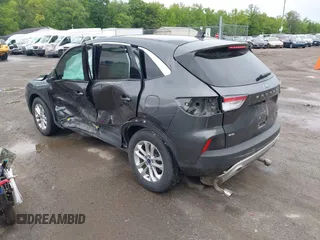 2020 Ford Escape SE with VIN 1FMCU9G64LUA25167, listed as a IAAI auction lot 42307557 with 82,524 mi miles and . Bid and sale history available at DreamBid. Image 3.