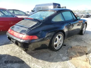 1995 Porsche 911 Carrera with VIN WP0AA2990SS323244, listed as a Copart auction lot 77215074 with 0 mi miles and Non Repairable. Bid and sale history available at carsss.com. Image 3.