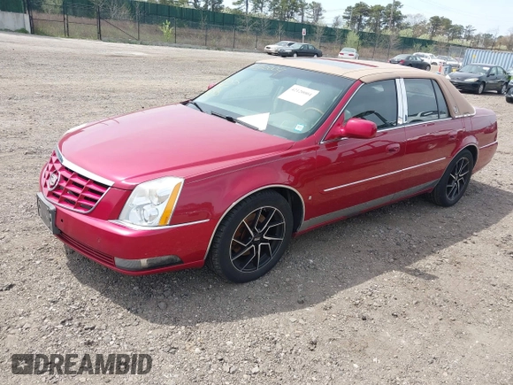 2006 Cadillac DTS w/1SE with VIN 1G6KD57996U113240, listed as a IAAI auction lot 42120004 with 120,806 mi miles. Bid and sale history available at carsss.com. Image 2.