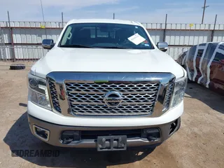 2017 Nissan Titan SV with VIN 1N6AA1E5XHN532587, listed as a IAAI auction lot 42019155 with 90,496 mi miles and . Bid and sale history available at DreamBid. Image 12.
