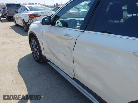 2021 BMW X1 sDrive28i z VIN WBXJG7C01M3M73496, wystawiony jako IAAI lot #42132005 z przebiegiem 23 278 mil mil oraz . Historia ofert i sprzedaży dostępna na DreamBid. Obrazek 6.