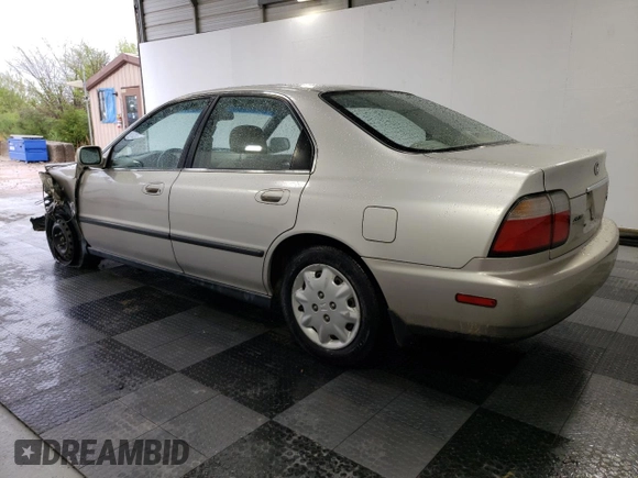 1997 Honda Accord LX with VIN JHMCD5630VC015585, listed as a Copart auction lot 52166155 with 121,820 mi miles and Salvage Title. Bid and sale history available at carsss.com. Image 2.