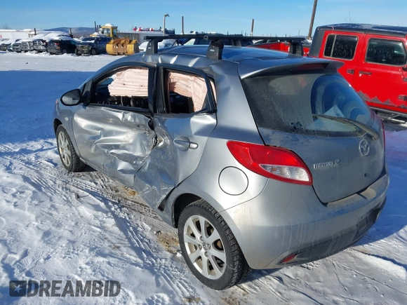 2013 Mazda 2 Touring z VIN JM1DE1LYXD0153291, wystawiony jako IAAI lot #41671574 z przebiegiem Nie podano mil oraz . Historia ofert i sprzedaży dostępna na DreamBid. Obrazek 3.