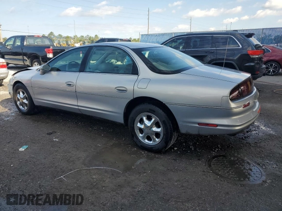 1997 Oldsmobile Aurora with VIN 1G3GR62C0V4102252, listed as a Copart auction lot 53270245 with 123,615 mi miles and Salvage Title. Bid and sale history available at DreamBid. Image 2.